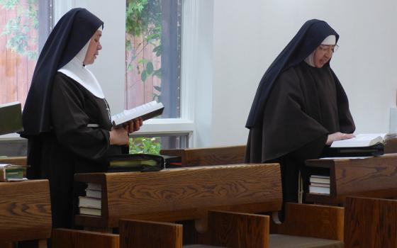 Capuchin Poor Clare Srs. Maria Elena Romero, left, and Maria de la Luz Solorio, pray the Liturgy of the Hours Sept. 27 at the Veronica Giuliani Monastery in Wilmington, Delaware. Contemplative life will participate in spirit and pray for those present at the synod so that all voices are heard, said Romero. (GSR photo/Rhina Guidos)